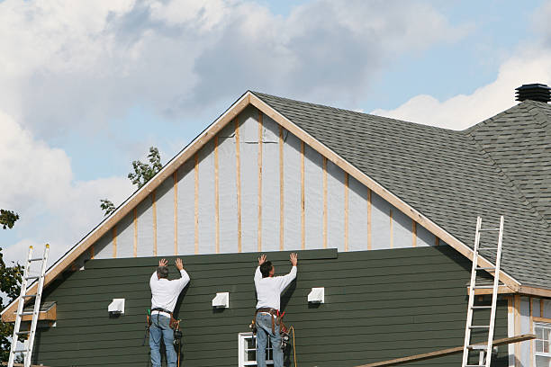 Professional Siding Installation technician working in Hooversville, PA